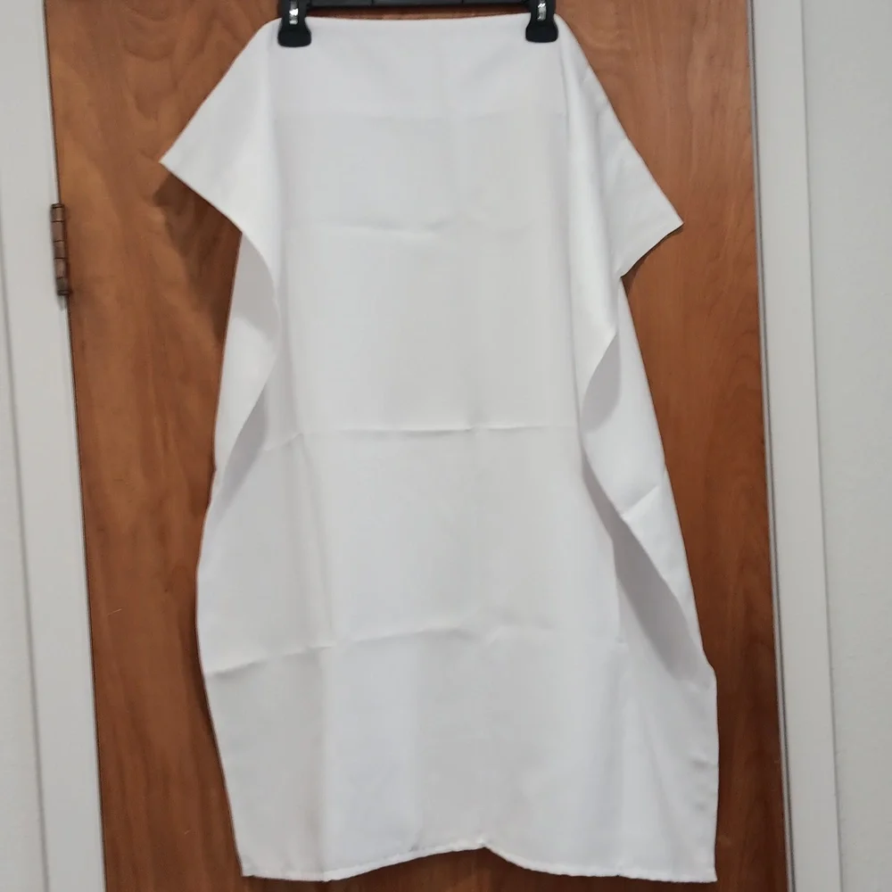 4 Curtain Panels. Never Used